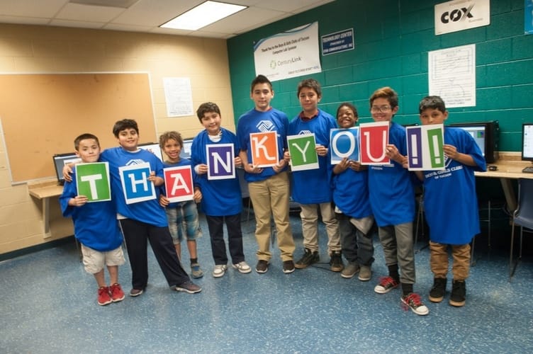 Boys and Girls Club of Tucson Holding Thank You!! Sign